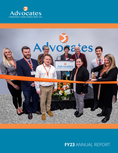 Cover of Annual Report featuring photo of ribbon cutting at Community Behavioral Health Center grand opening.