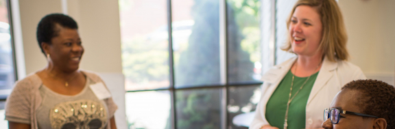 three people looking relaxed and happy