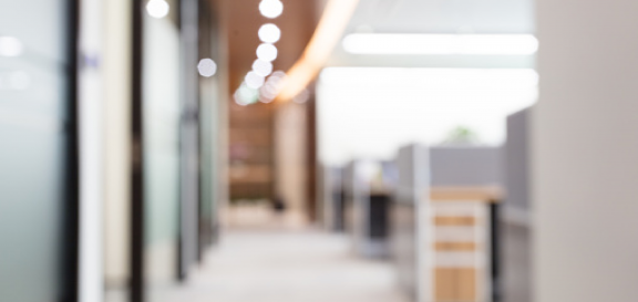 diffused view of a walkway in an office environment